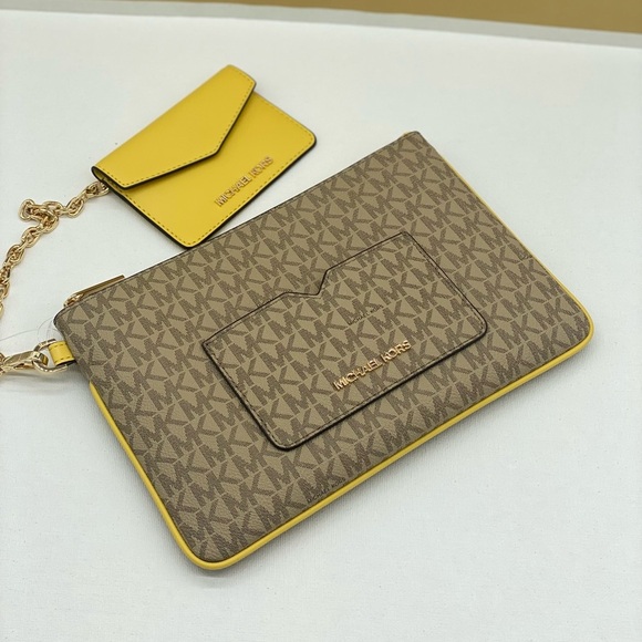 Michael Kors Handbags - MICHAEL KORS JET SET TRAVEL
LG 2 in 1 WRISTLET AND CARD CASE